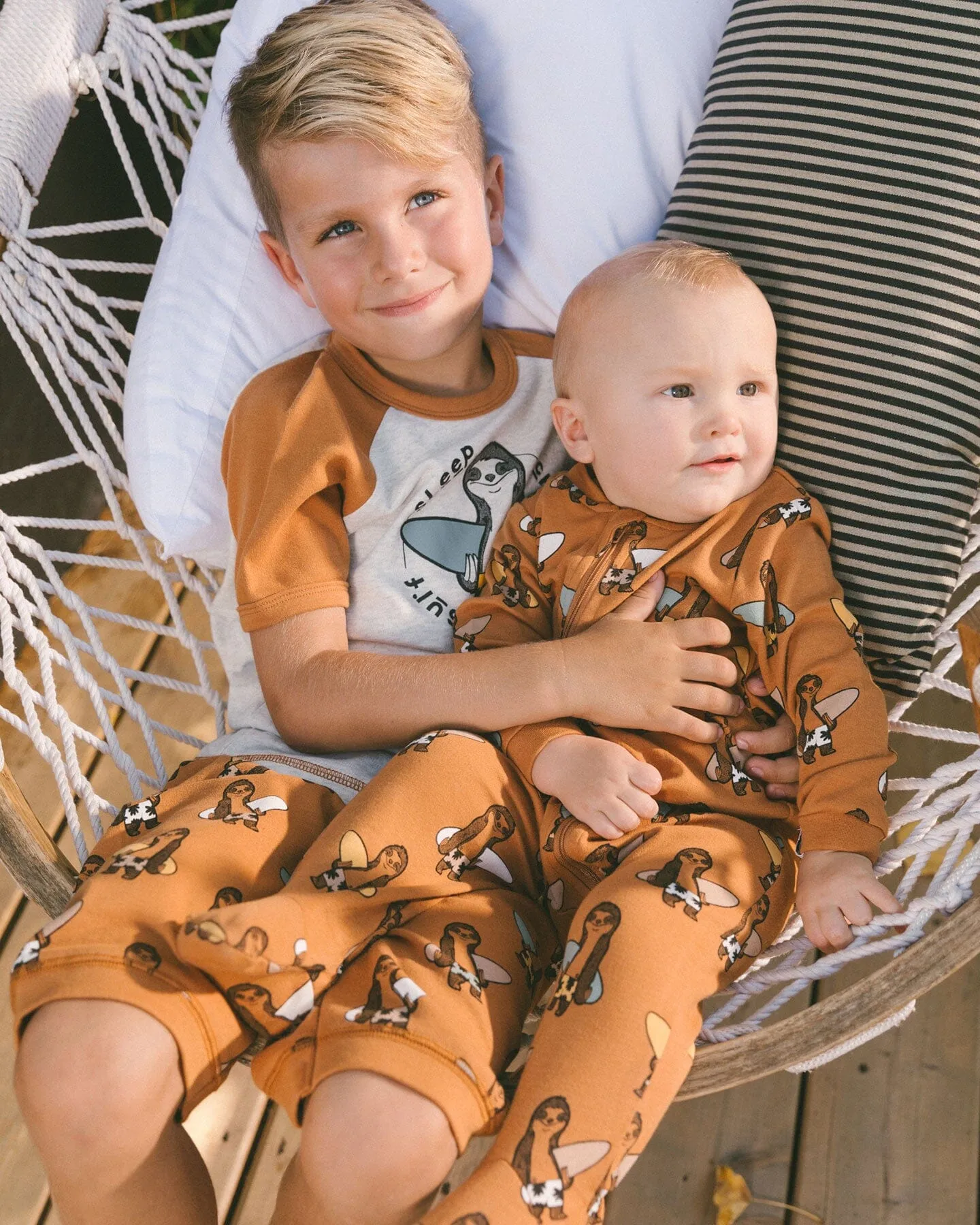 Printed Organic Cotton One-Piece Pajama Sloths On Tan Background